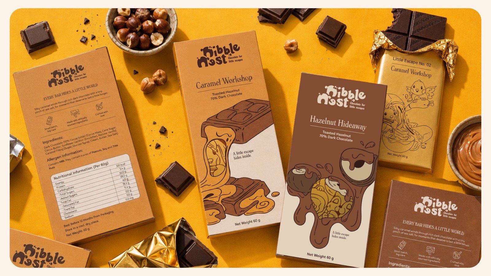 An overhead arrangement on a yellow ground: two chocolate cartons face up, a third turned to its nutrition panel, a half-unwrapped gold foil bar, a bowl of hazelnuts and a bowl of caramel.